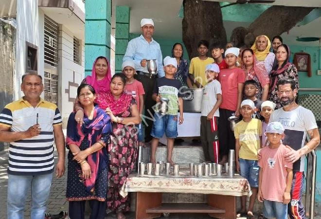 Cold sweet water was poured dedicated to the joti jot day of satguru ravidas maharaj ji: Pirthipal kaile